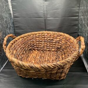 Large woven basket with handles. Thick woven